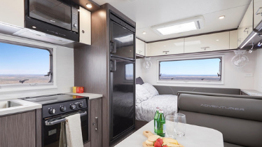 Interior boat kitchen with mounted Caframo fan